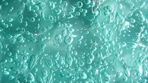 Macro Shot of air Bubbles in Transparent Cosmetic Liquid Gel Cream. Blue Stock-Footage 155361593