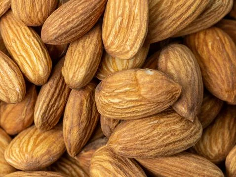 Macro shot of Almonds flat lay showcasing their texture Stock-Fotos