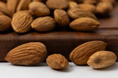 Macro shot of Almonds showcasing it's texture with blurred background of al.. Stock-Fotos