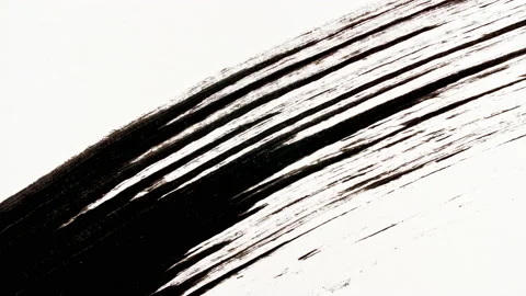 Macro shot and slow motion of a black mascara isolated on white background Stock Footage 168183995