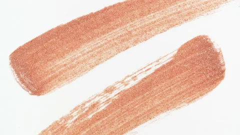 Macro shot and slow motion of a brush, applicator, smear, concealer isolated on Stock Footage 169921863