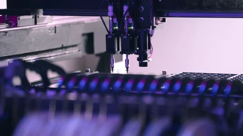 Macro shot of automated robot fixing chips on board Stock Footage 129671251