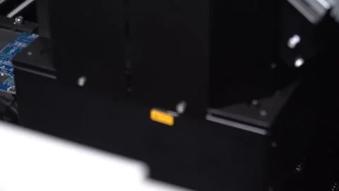 Macro Shot of Automatic Pick and Place machine quickly installs Components on Ci Stock Footage 258641468