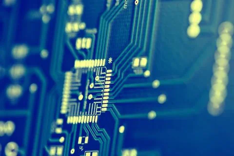 Macro shot of the back side of a circuit board. Close up of the blue circui.. Stock Photos