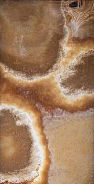 Macro shot of backlit amber onyx stone showing translucent structures and c.. Stock Photos