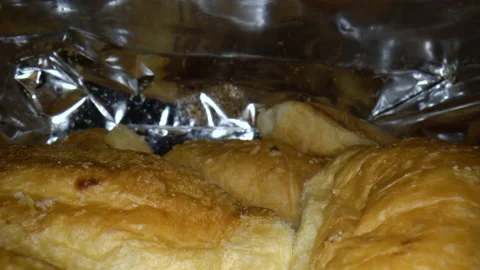 Macro shot baked croissants in a package Stock Footage 159727552