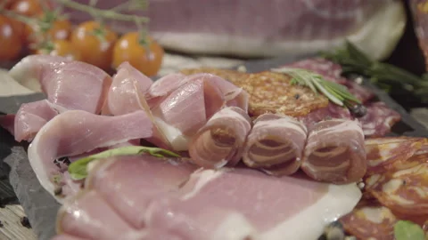 Macro shot of beef slices and tomatoes. Plating food for holidays. 4k Stock Footage 143645593
