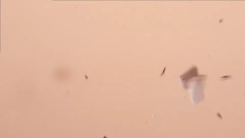 Macro shot of beige powder collision in slow motion Stock Footage 338350360