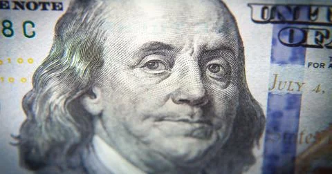 Macro shot. Benjamin Franklin's face. Dollar Stock-Illustration
