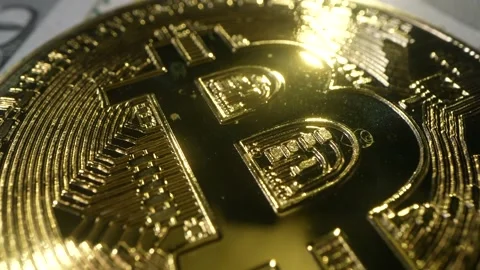 Macro shot of Bitcoin coins. 4K video of BTC. Golden Bitcoin, crypto currency Video stock 176837757
