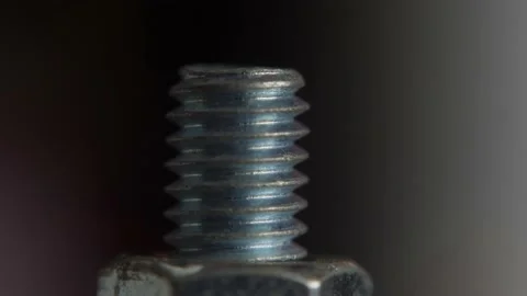 Macro Shot of bolt the nut by hand Vídeo Stock 152054371