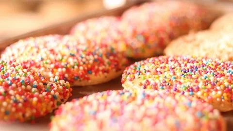 Macro shot of bread with decorated confetti Stock Footage 130085057