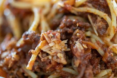 Macro shot of a bunch of spaghetti with minced meat sauce, Bolognese Stock Photos