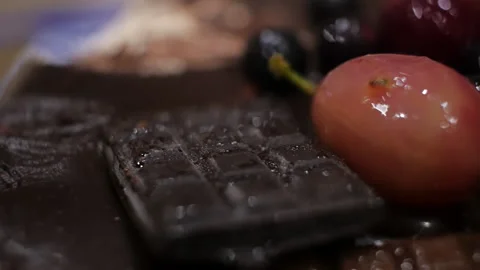 Macro shot of a cake with berries and grated chocolate Stock Footage 147739783