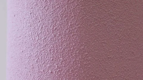 Macro shot of cake texture covered with violet spray chocolate coating Stock Footage 303970793