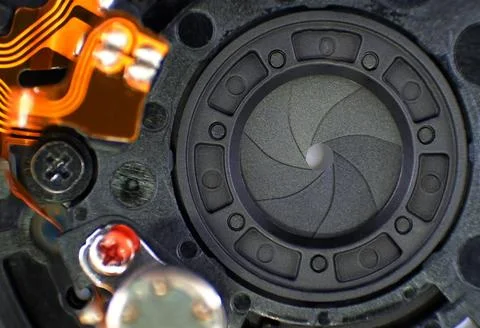 Macro shot of camera lens aperture blades and internal electronics mechanism Stock-Fotos