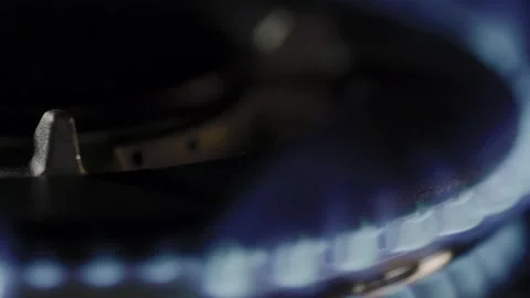 Macro shot capturing the mesmerizing motion of a gas flame Stock Footage 301666552