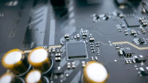 Macro shot of central processor chip on printed circuit board with capacito.. Stock Photos