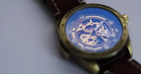 Macro Shot Clock Face and Internal Working Mechanism with Rapidly Rotating Ar Stock Footage 300363952
