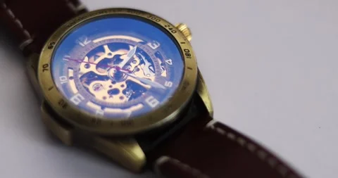 Macro Shot Clock Face and Internal Working Mechanism with Rapidly Rotating Ar Stock Footage 300363970