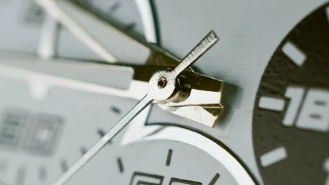 Macro shot of clock face with seconds arrow. Fast flow of time concept. Real  Foto stock