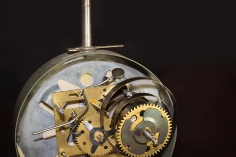 Macro shot of clockwork gears inside the watch Stock Photos