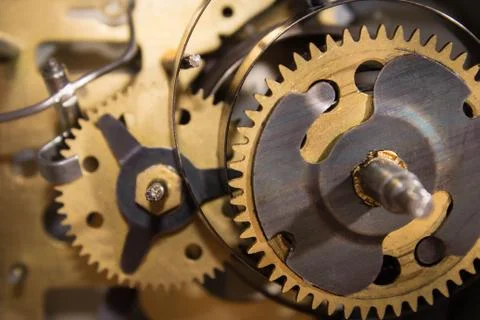 Macro shot of clockwork gears inside the watch Stock Photos