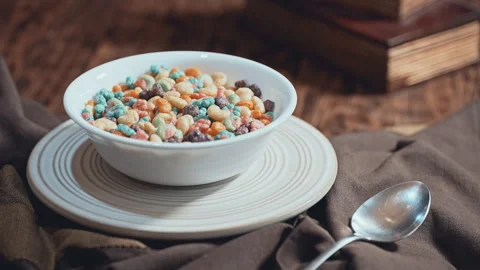 Macro Shot of Colorful Fruit Cereal Rings in Milk Vídeo Stock 335894971