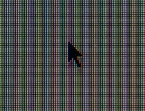 Macro shot of computer mouse pointer with RGB pixels visible Stock Photos