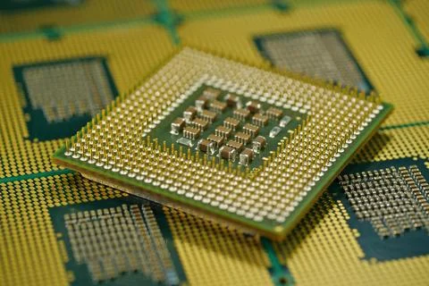 Macro shot of CPU showing grid array of contact pins for motherboard fitting Stock Photos