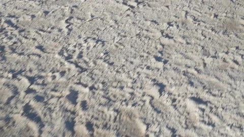 Macro-shot of cracked soil filled with salt, in Atacama, Chile Stock Footage 237032994