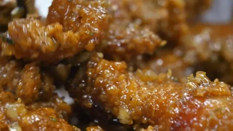 Macro Shot of Crispy Korean Fried Chicken with Glaze Stock-Footage 343028807