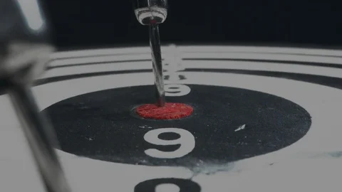 Macro shot of dartboard with arrows like flags in targets Stock Footage 123201540