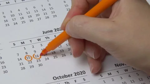 Macro shot date of month on calendar circled by color marker. Stock Footage 143195791