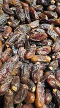 Macro shot of dates shows rich texture earthy tones 写真素材