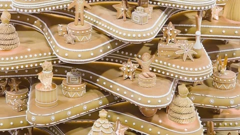 Macro shot of decorations made of gingerbread cake biscuit with dancers, bears, Stock Footage 331313916