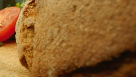 Macro shot of delicious fresh home-made salad ingridients, bread and eggs at the Stock Footage 107561785