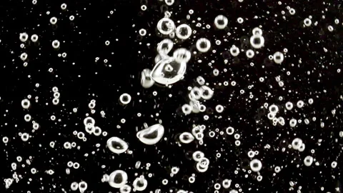 Macro Shot of Different Sized Clear Air Bubbles in Clear Water Rising up on 스톡 동영상 265900867