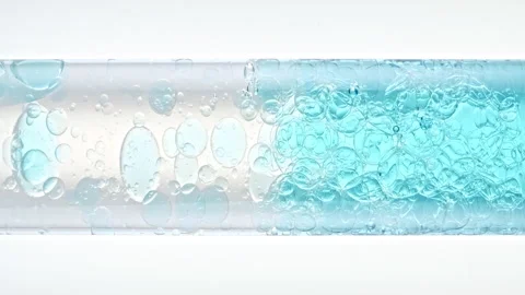 Macro Shot of Different Sized Clear Air Bubbles in Clear Water Rising up in Stock Footage 275979805