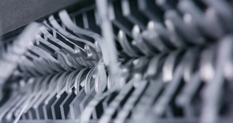 Macro shot of document shredded in mechanical shredder device Stock Footage 123732973