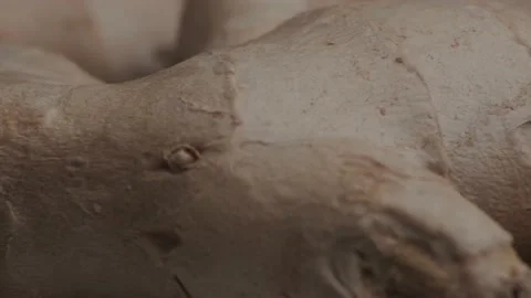 Macro shot of dried ginger roots - famous aromatic spice and plant. Stock Footage 141823105
