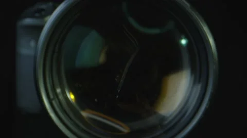 Macro shot DSLR camera with black ground Stock Footage 130681045