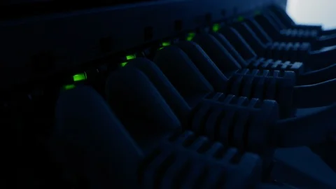 Macro Shot: Ethernet Data Center Cables Connected to Router Ports with Lights Stock Footage 120925033