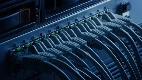 Macro Shot: Ethernet Data Center Cables Connected to Router Ports with Lights Stock Footage 120926185