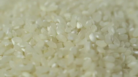 Macro shot of falling rice 스톡 동영상 157586280