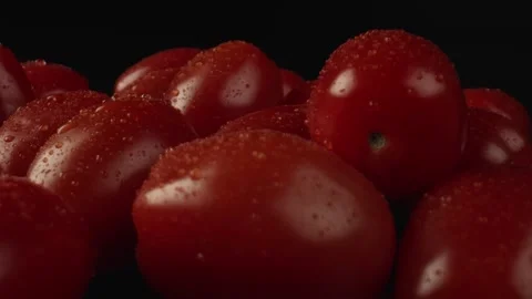 Macro shot of a few large tomatoes on the kitchen table. The concept of healthy Video stock 164632254