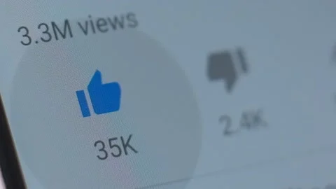 Macro shot finger clicks on like icon in social network. Stock Footage 130775758
