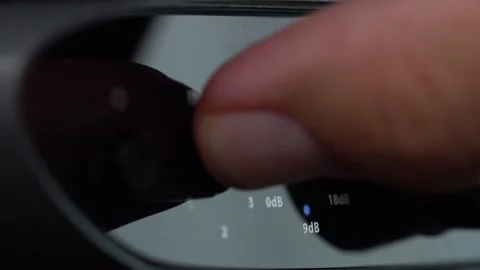 Macro Shot of Finger Pressing Audio Input Button Stock Footage 318639221