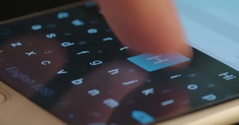 Macro shot of Finger typing on smartphone keyboard Stock Footage 67487351