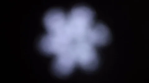 Macro shot with focus pull of snowflake in the dark Stock Footage 72805699